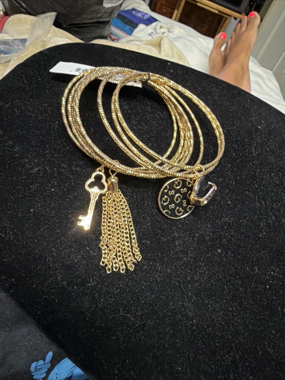 Guess Goldtone 13 piece key , Tassle , charms rare